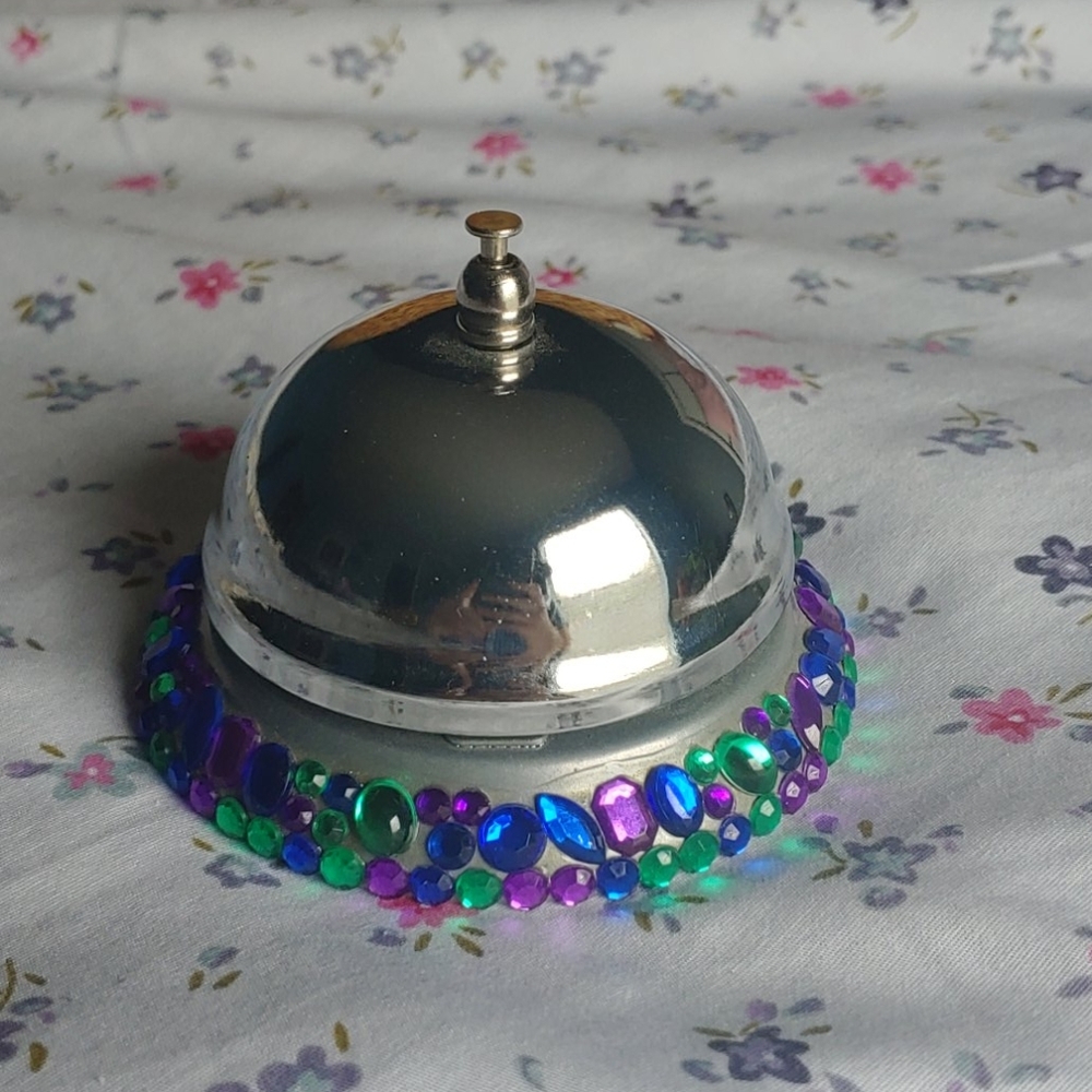 Bell with multicolor gem stones